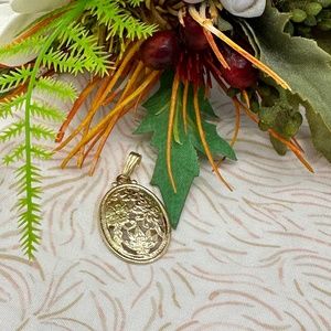 VINTAGE MING'S 14K HAWAII FOUR SEASON OVAL PENDANT